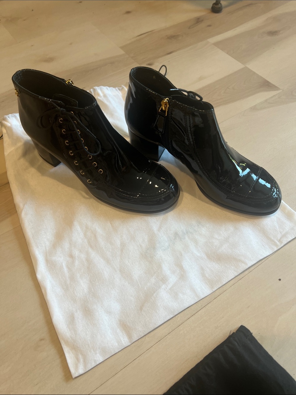 CHANEL Black Patent Lace-Up Ankle Boots with Gold Zipper Hardware